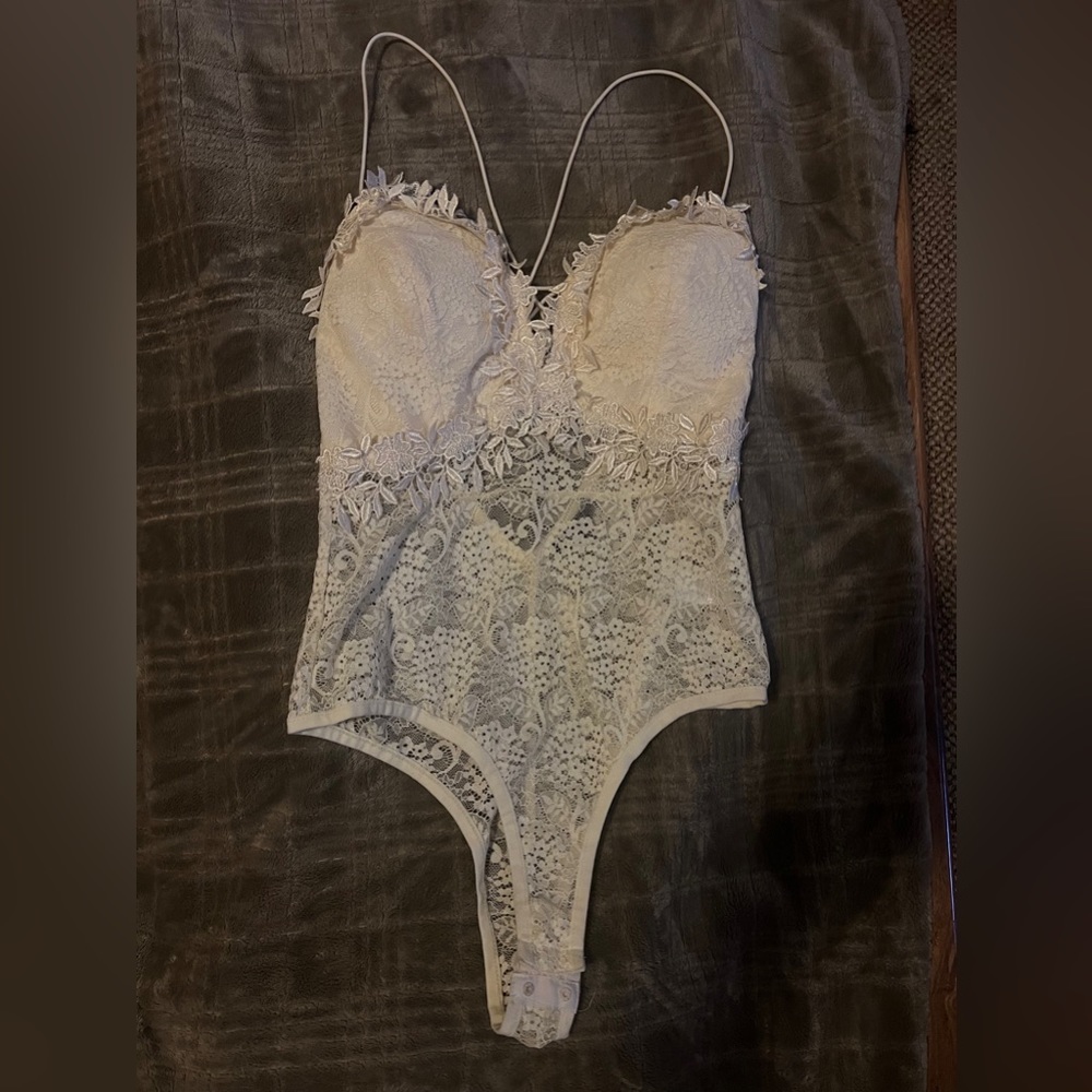 Lace body suit..padded size Medium